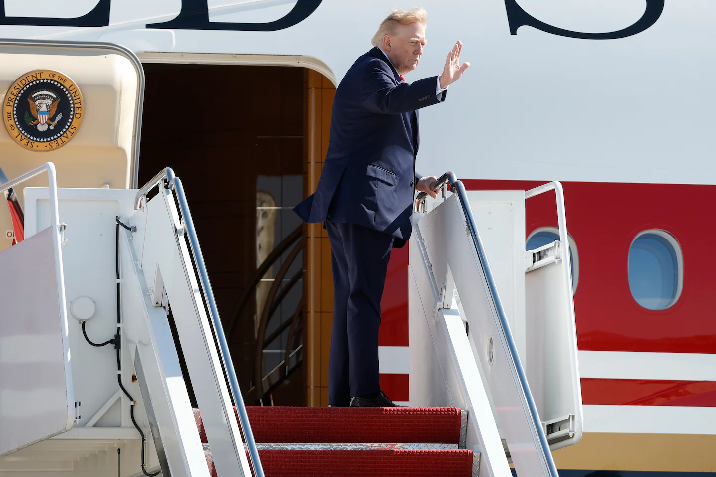 Trump posts video on Truth Social of man being attacked by tiger