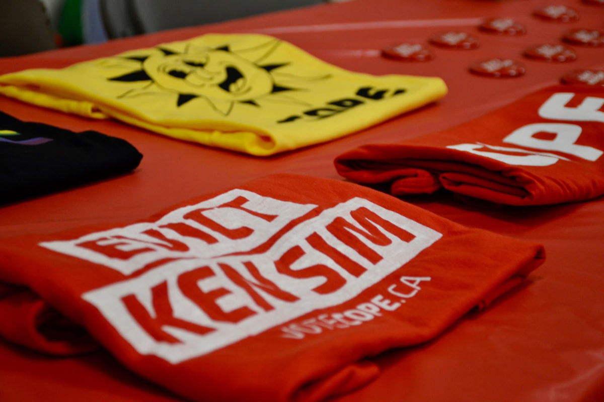 Evict Ken Sim T-shirts.