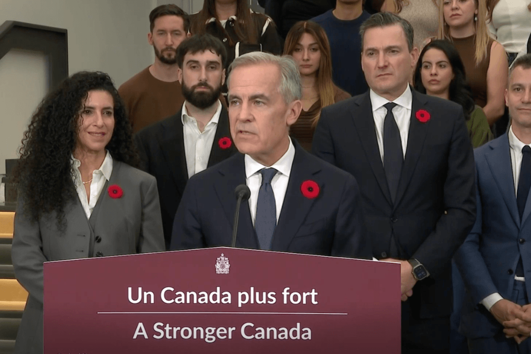 Mark Carney makes a funding announcement at AI research institute Mila.