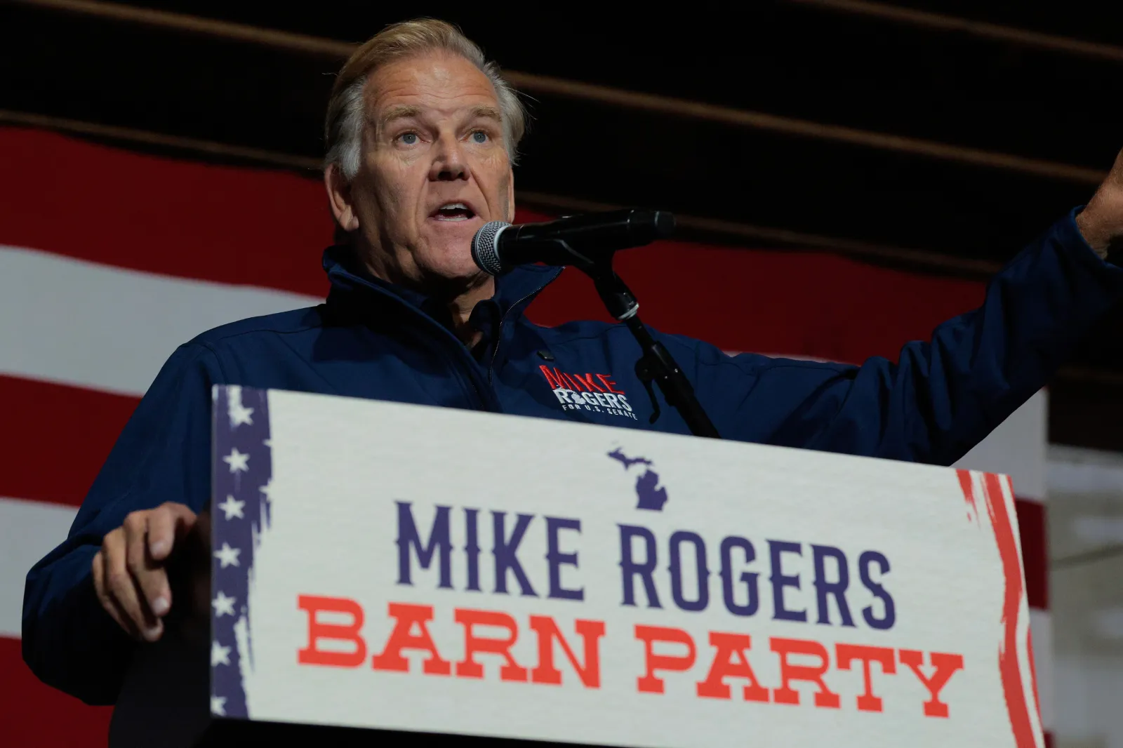 Mike Rogers speaks during a barn party campaign event at Hoffman Farms Winery on October 09, 2026 in Highland Township, Michigan.