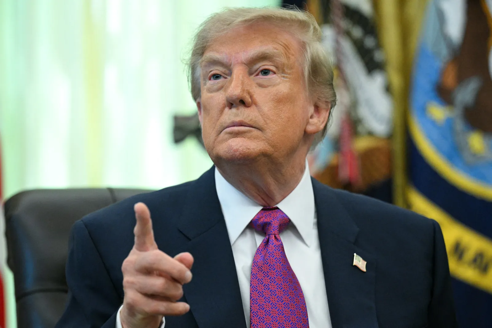 US President Donald Trump speaks after signing an executive order that aims to rename Lake Ontario to Lake America in the Oval Office of the White House in Washington, DC, on August 27, 2026