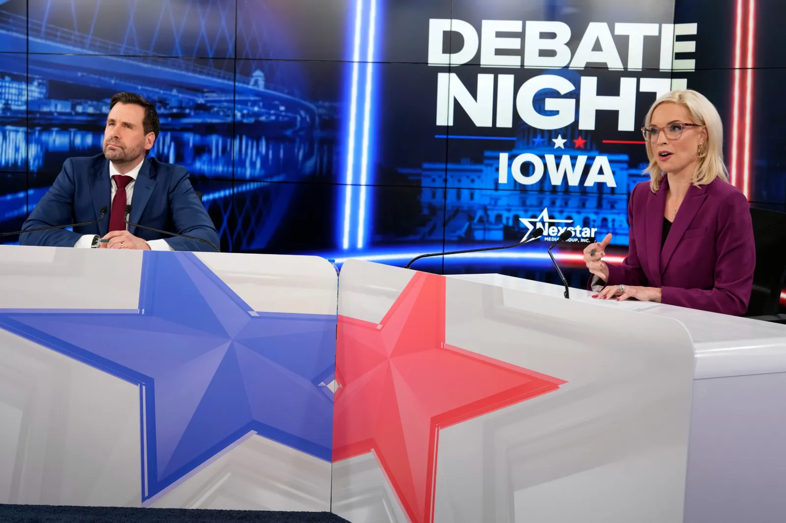 Republican nominee for U.S. Senate Ashley Hinson, right, speaks during a televised debate with Democratic nominee for U.S. Senate Josh Turek at WHO 13, Tuesday, Oct. 13, 2026, in Des Moines, Iowa.