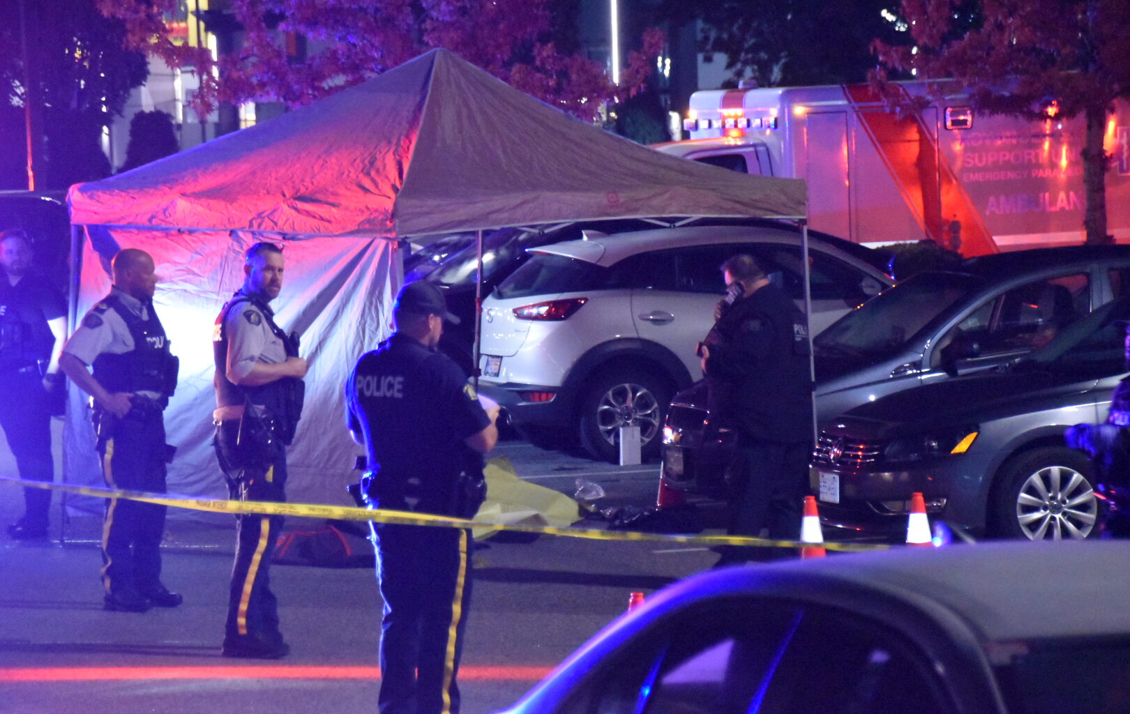 Massive police presence, forensics tent, seen outside Langley restaurant