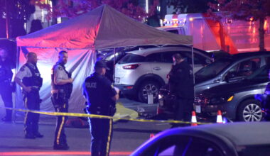 Massive police presence, forensics tent, seen outside Langley restaurant