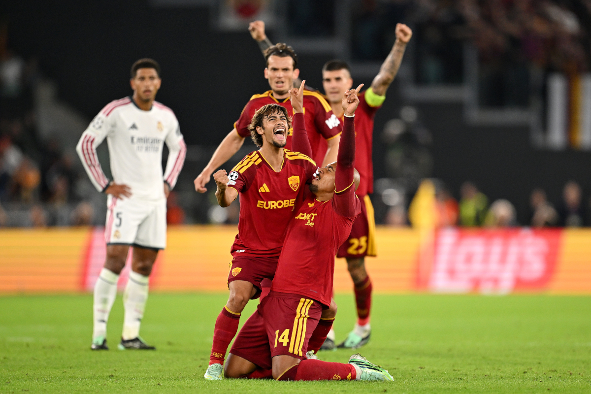 ROME, ITALY - OCTOBER 14: Donyell Malen and Rodrigo Mora of AS Roma celebrates scoring his team’s third goal during the UEFA Champions League 2026/27 League Phase MD2 match between AS Roma and Real Madrid C.F. at Stadio Olimpico on October 14, 2026 in Rome, Italy. (Photo by Tullio M. Puglia/Getty Images)