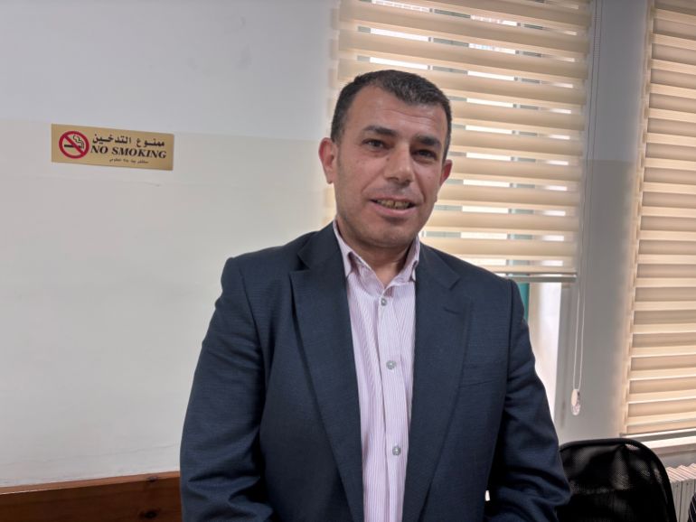 Dr Hisham Amle, an oncologist at the hospital in Beit Jala [Al Jazeera]