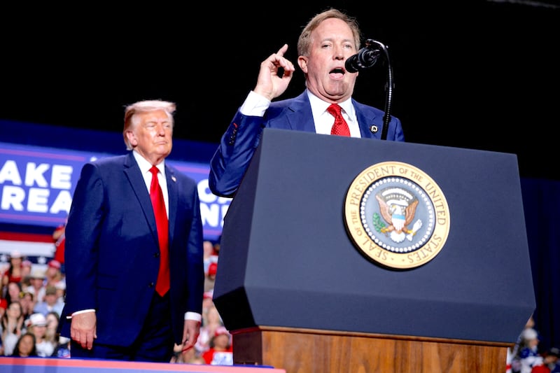 Donald Trump and Republican US Senate candidate Ken Paxton attend a campaign rally at Freeman Coliseum in San Antonio, Texas, US, October 7, 2026.