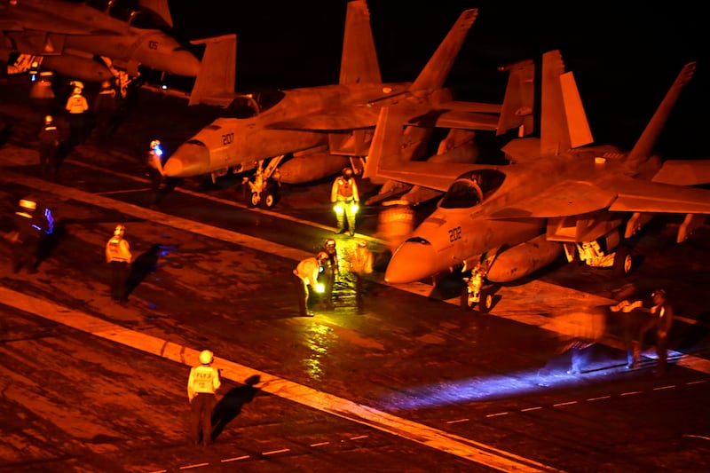 F/A-18 Super Hornets stand ready for launch on the flight deck of U.S. Navy Nimitz-class aircraft carrier USS George Washington, en route to support U.S. military operations in the war with Iran, while operating in the Indian Ocean August 18, 2026. U.S. Navy/Chief Mass Communication Specialist Joshua Karsten/Handout via REUTERS THIS IMAGE HAS BEEN SUPPLIED BY A THIRD PARTY