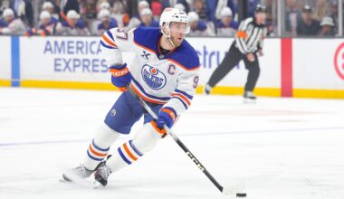 Oilers' McDavid sets NHL record with 13-game season-opening assist streak