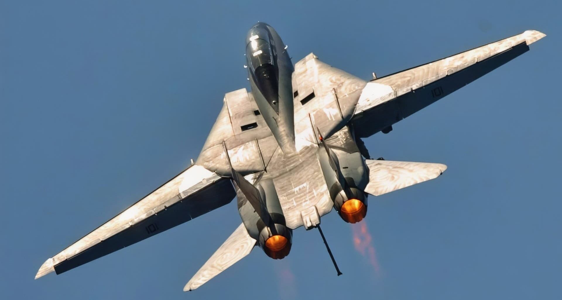 An F-14D Tomcat pulls up after performing a fly-by past the aircraft carrier USS Dwight D. Eisenhower (CVN 69) as the ship operates in the Atlantic Ocean on June 19, 2006. DoD photo by Petty Officer 2nd Class Miguel A. Contreras, U.S. Navy. (Released) PH2 CONTRERAS MIGUEL