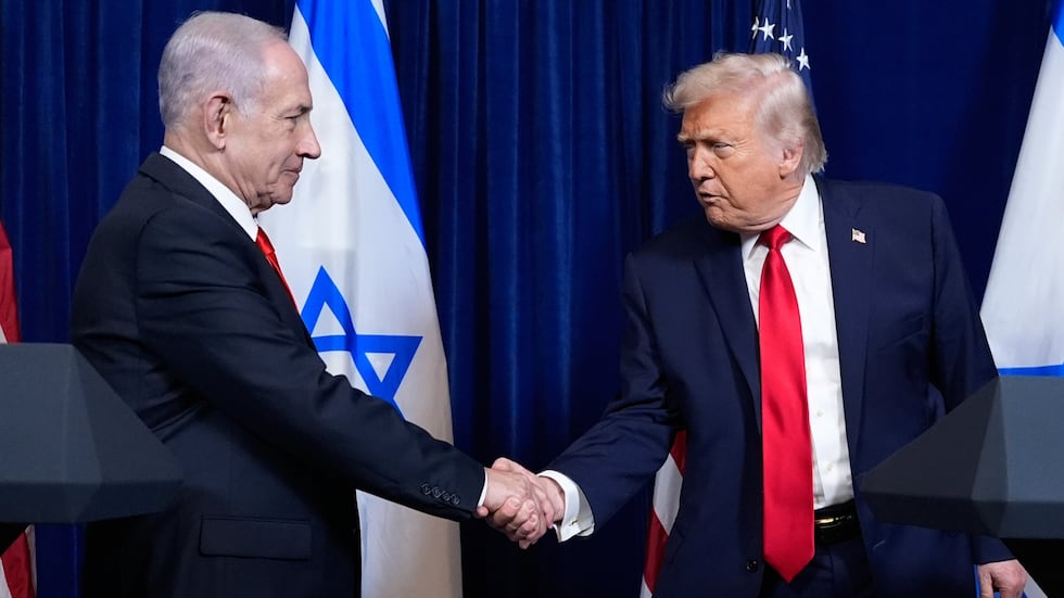 President Donald Trump shakes hands with Israel's Prime Minister Benjamin Netanyahu at the end...