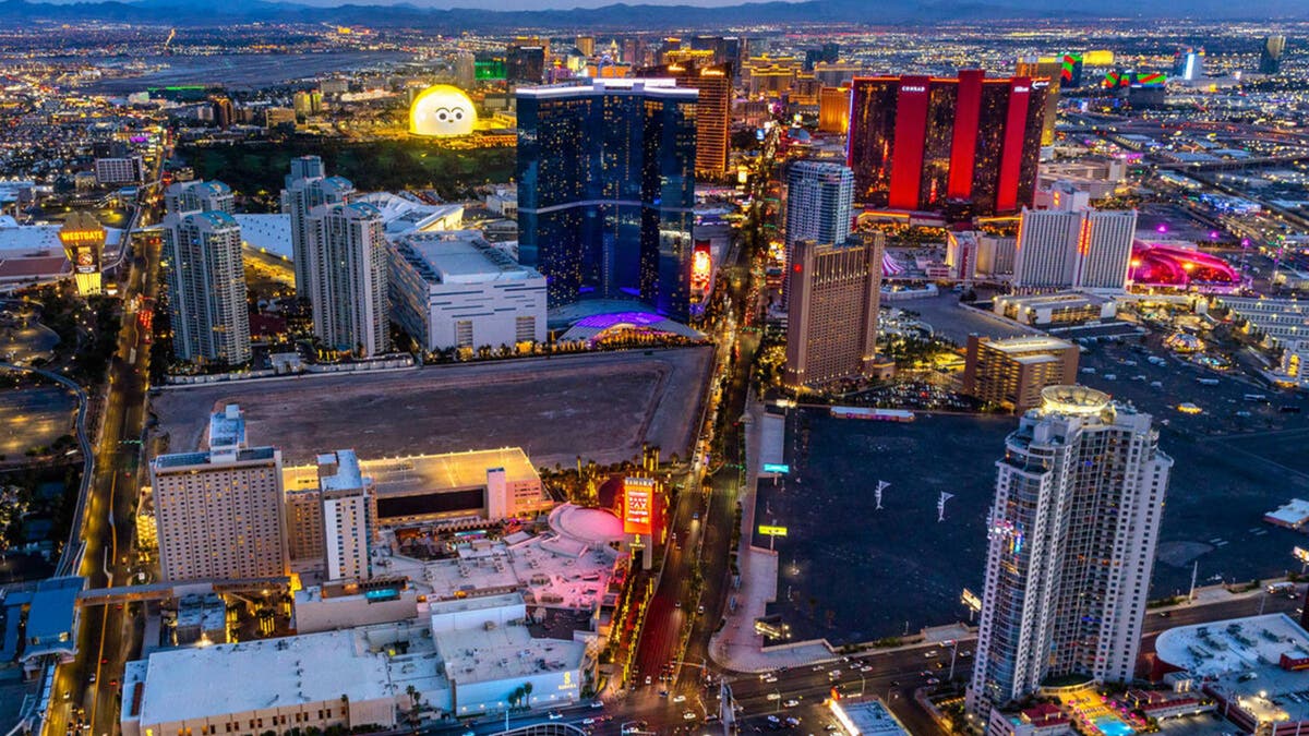 The Las Vegas skyline rises with casinos and hotels viewed from The Strat observation deck.