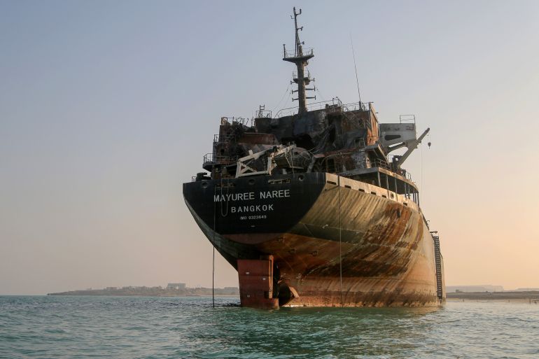 The Thailand-flagged bulk carrier Mayuree Naree, which was struck by a missile near the Strait of Hormuz, is seen stranded off the coast of Iran’s Qeshm Island