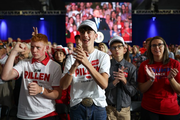 Guests look on as President Trump speaks at a campaign rally at in Grand Island, Nebraska on Monday. 