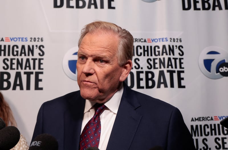 Republican nominee for US Senate Mike Rogers speaks to the media in the spin room following the US Senate debate against Democratic US Senate nominee Abdul El-Sayed in Southfield, Michigan US October 21, 2026.