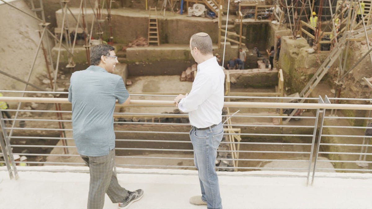 Dinesh D'Souza standing with Ze'ev Orenstein at Pool of Siloam.