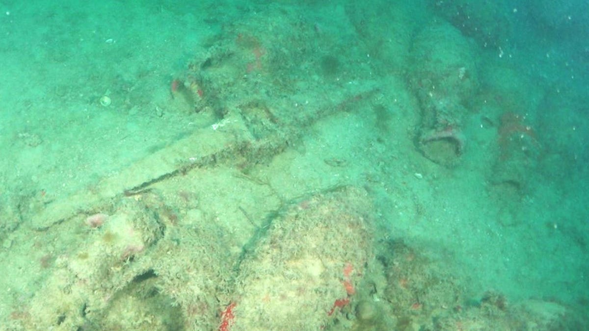 View of amphorae beneath sand