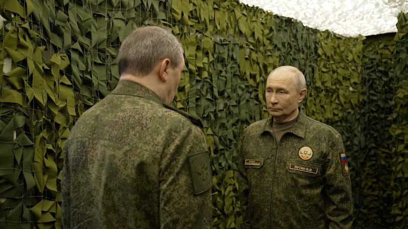 Russian President Vladimir Putin listens to Chief of the General Staff of Russian Armed Forces Valery Gerasimov at a command post of Russia's joint force grouping, in the course of the Russia-Ukraine conflict, at an unidentified location, in this still image taken from a video released on October 16, 2026.
