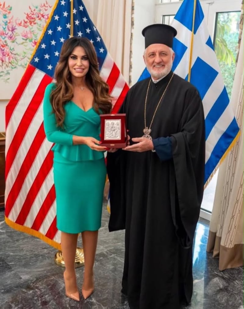 Kimberly Guilfoyle, seen with Archbishop Elpidophoros of America, has opted for a series of low-cut tops while meeting with Greek Orthodox clergy.
