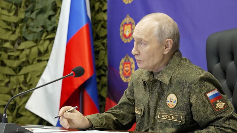 Russian President Vladimir Putin visits a command post of Russia's joint force grouping, in the course of the Russia-Ukraine conflict, at an unidentified location, in this still image taken from a video released on October 16, 2026.