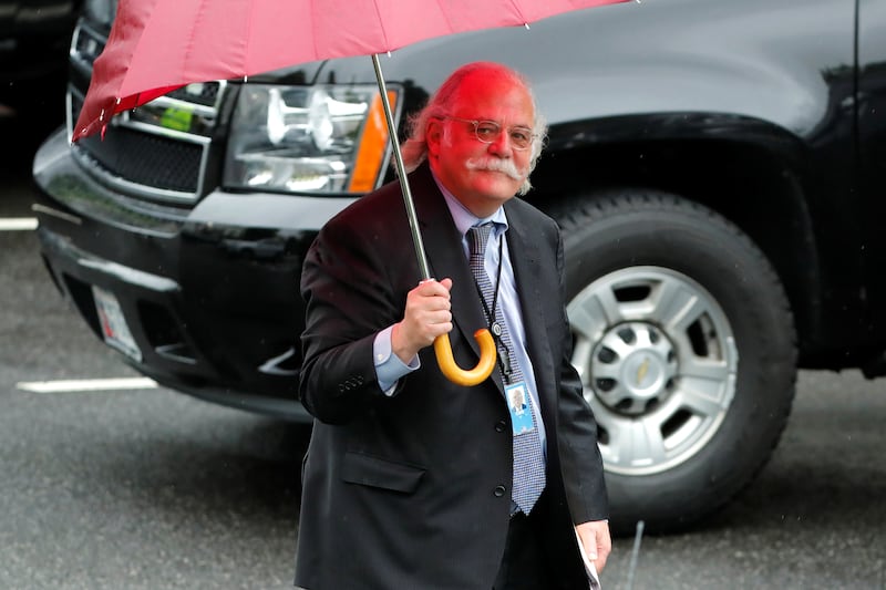 Outgoing White House attorney Ty Cobb walks to his car at the White House in Washington, U.S. May 17, 2018.  REUTERS/Jonathan Ernst