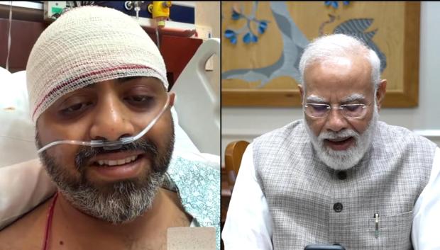 This screengrab from Narendra Modi YouTube Channel shows Indian Prime Minister Narendra Modi speaking with FlyDubai pilot Capt. Smit Machchhar on Friday, Oct. 2, 2026. (Narendra Modi YouTube Channel via AP )