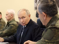 Russian President Vladimir Putin observes the Centre-2026 military exercises at the Chebarkul range in Chelyabinsk Region, Russia October 2, 2026.