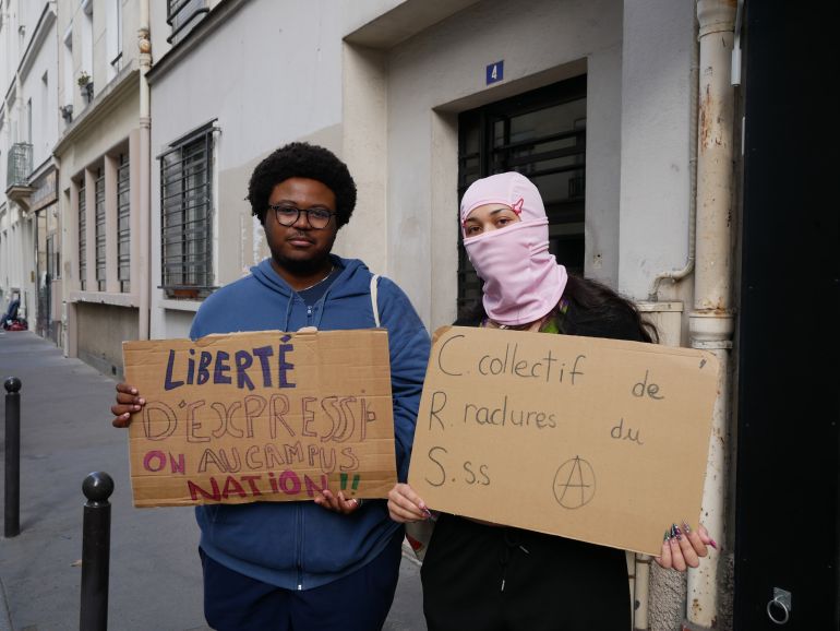 Paris students Tim and Tina, 20, were among the tens of thousands protesting