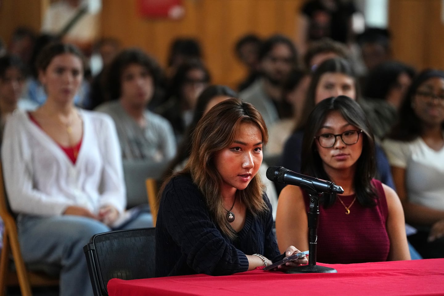 Cornell University students and ACLU student chapter members Jane Wang, left and Sophia Riley Sim spoke about sexual violence on campus during a student assembly meeting Oct. 1. 
