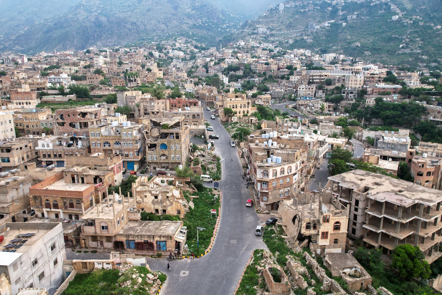 This aerial photograph shows damaged buildings in the city of Taiz, in southwestern Yemen on Sept. 25.
