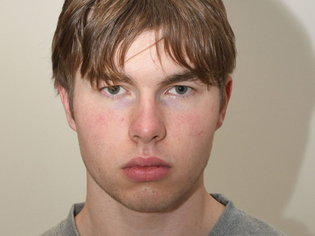 Johannes Natland, 19 Johannes Natland, 19, is on trial at the Old Bailey accused of travelling from Norway to Manchester Airport on 17 March last year to carrying a gun