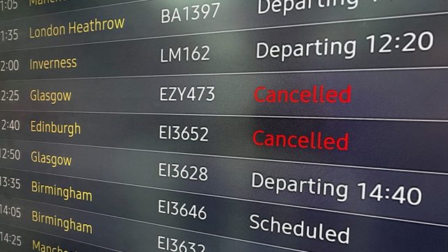 A flight departure board showing cancellations on flights to Scotland, at George Best Belfast City Airport during disruption because of a 