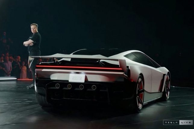 A grab taken on October 16, 2026 from a live feed released by Tesla shows Tech billionaire Elon Musk unveiling on October 15 the next-generation Roadster electric car in McGregor, Texas, United States. (Photo by Tesla / AFP via Getty Images) / RESTRICTED TO EDITORIAL USE - MANDATORY CREDIT 