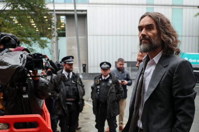 British actor and comedian Russell Brand arrives at Southwark Crown Court where he stands trial on charges of rape and sexual assault involving six women between 1999 and 2009, which he denies, in London, Britain, October 16, 2026. REUTERS/Isabel Infantes