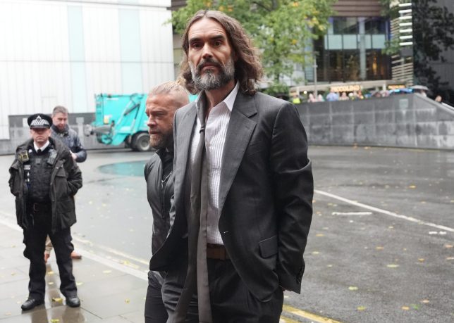 Russell Brand arriving at Southwark Crown Court, London, where he faces three charges of rape, indecent assault, and three counts of sexual assault, relating to six women. Picture date: Friday October 16, 2026. PA Photo. Photo credit should read: Jonathan Brady/the Press Association