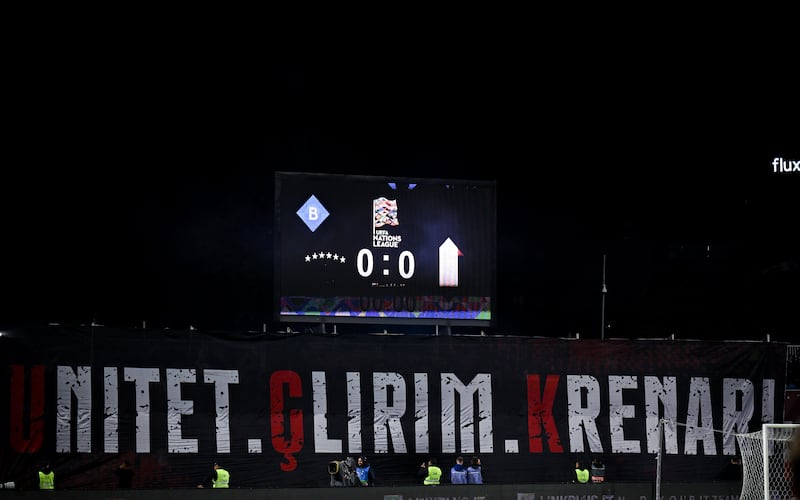 Kosovo supporters with banners in support of jailed former Kosovo Liberation Army leaders during the Nations League game against Ireland at Fadil Vokrri Stadium in Pristina, Kosovo, on September 24th. Photograph: Ben McShane/Sportsfile via Getty Images