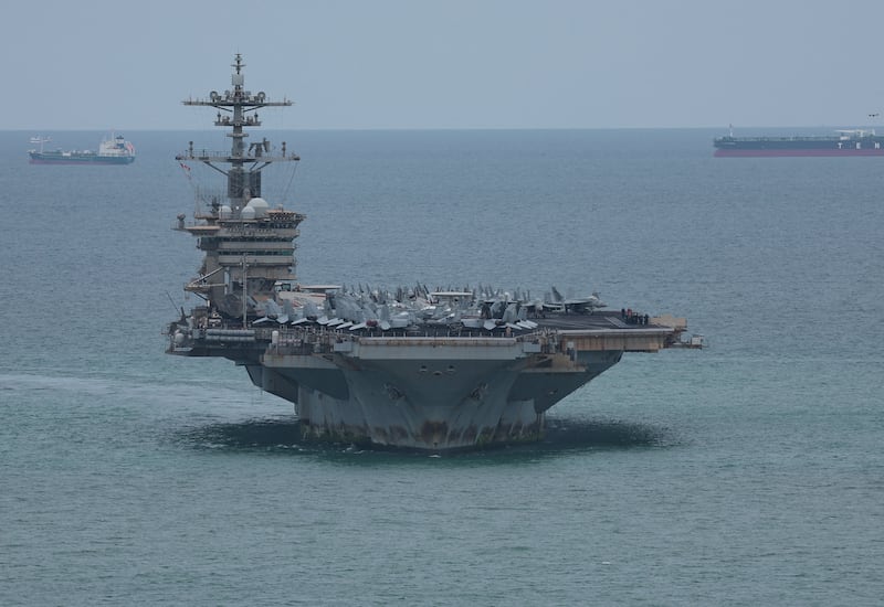 The U.S. Navy Nimitz-class aircraft carrier USS Abraham Lincoln sails toward Laem Chabang Port before docking for a rest stop following a long deployment in the Middle East, in Chonburi province, Thailand, September 2, 2026. REUTERS/Chalinee Thirasupa