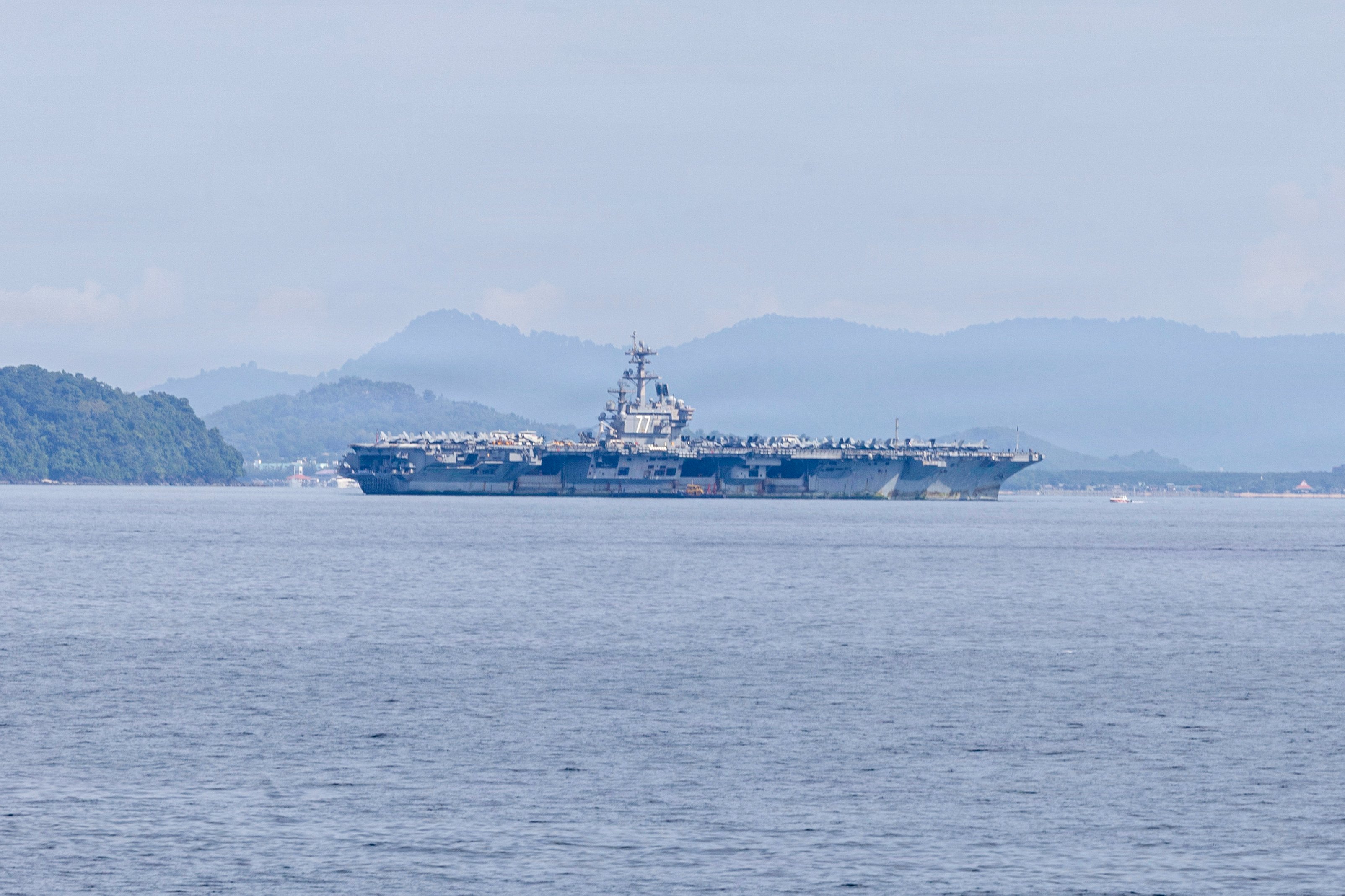 Nimitz-class aircraft carrier USS George H.W. Bush (CVN 77), arrives in Phuket, Thailand, Oct. 4, 2026. George H.W. Bush is conducting routine operations in the U.S. 7th Fleet area of operations. U.S. 7th Fleet, the Navy’s largest forward-deployed numbered fleet, routinely interacts and operates with allies and partners in preserving a free and open Indo-Pacific. (U.S. Navy Photo)