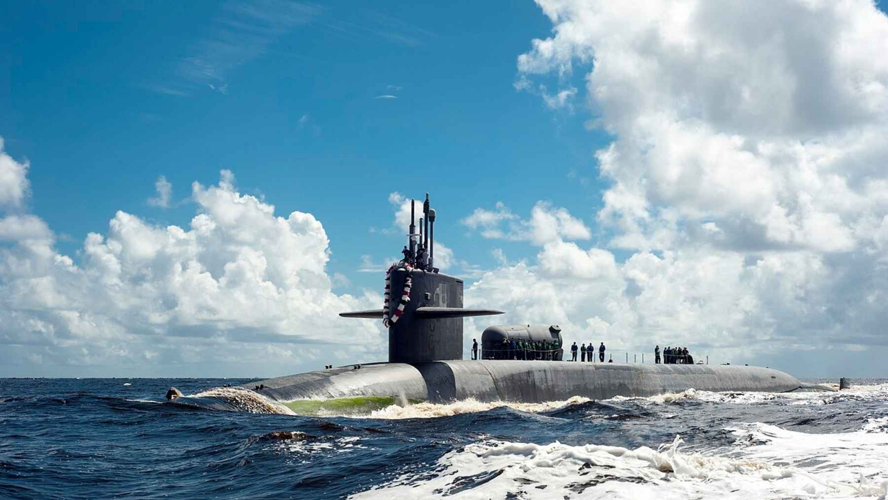 An 18,750-ton submarine, the biggest America ever built, came home for the last time after firing in the strikes on Iran, and the week she tied up the Navy signed for nine attack submarines that haul 40 cruise missiles apiece, four of them to match the 154 she carried alone