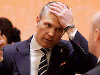 U.S. Secretary of Defense Pete Hegseth reacts prior to a state banquet hosted by Chinese President Xi Jinping at the Great Hall of the People on May 14, 2026 in Beijing, China.