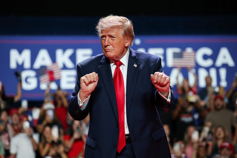 SAN ANTONIO, TEXAS - OCTOBER 07: U.S. President Donald Trump dances as he leaves the stage after speaking during a campaign rally at the Freeman Coliseum on October 07, 2026 in San Antonio, Texas. On his third trip to the state in the last 30 days, Trump is visiting Texas to campaign for Republican candidates, including Senate candidate and Texas Attorney General Ken Paxton, ahead of the midterm elections. (Photo by Win McNamee/Getty Images)