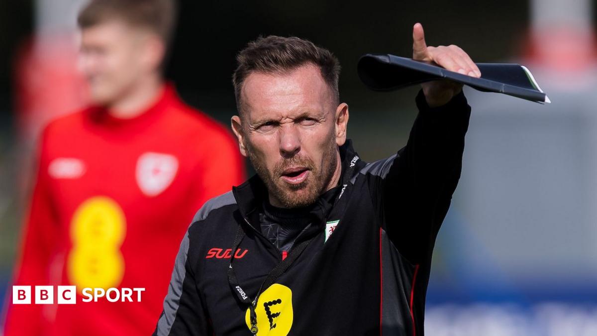 Craig Bellamy points during Wales training