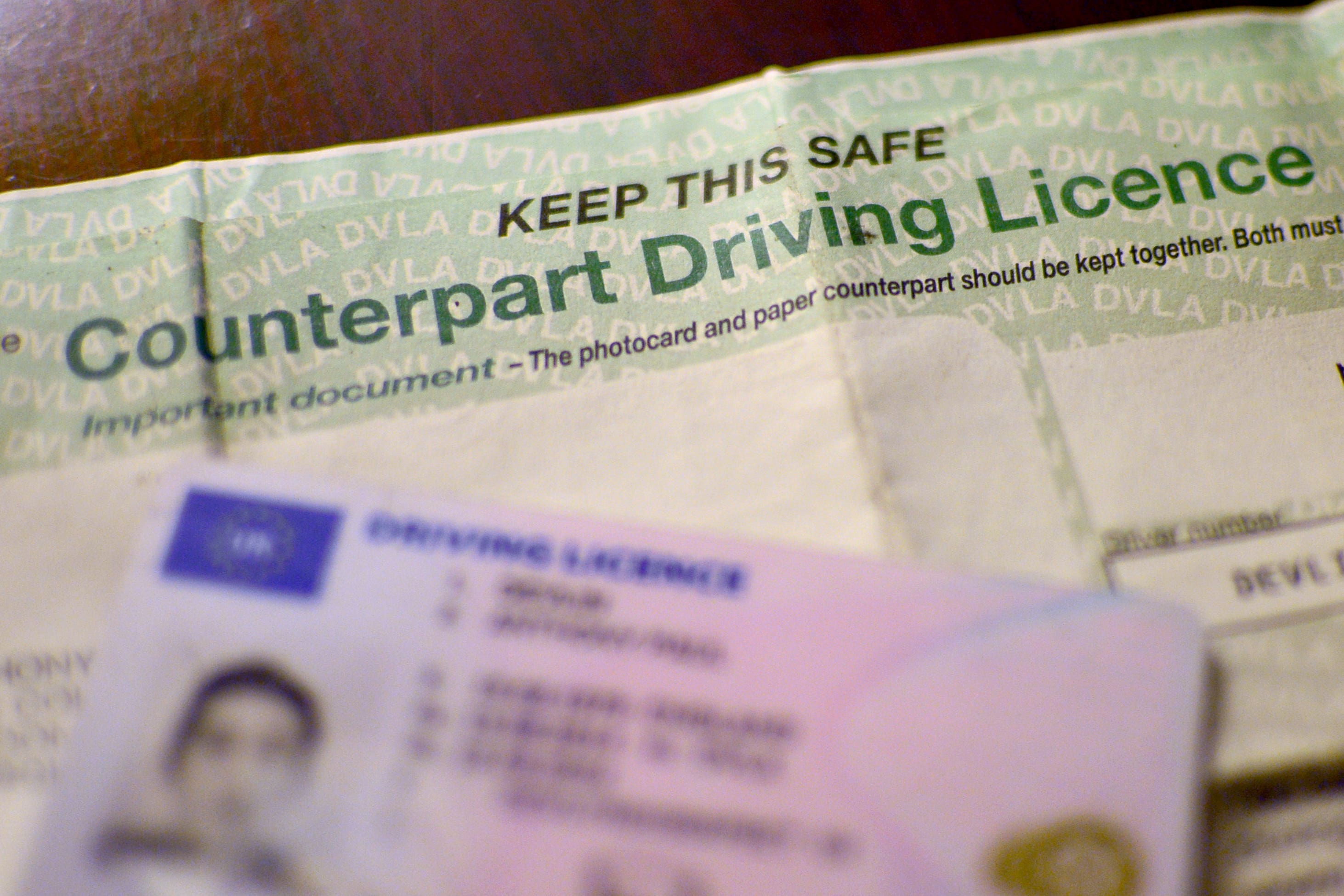 A UK driving licence shown beside a counterpart driving licence