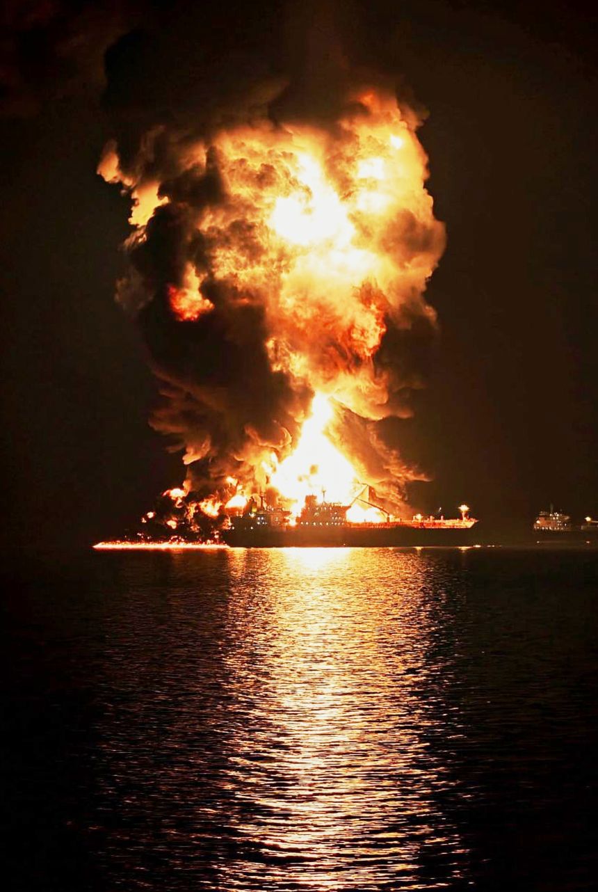 An oil tanker burns after being hit by an Iranian strike in the ship-to-ship transfer zone at Khor al-Zubair port near Basra, Iraq, March 11, 2026.