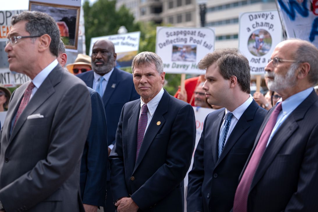 Former Olympic canoeist David Hearn, center, stands with his attorneys as they speak to reporters outside the District of Columbia Courthouse, on Friday, September 4, 2026, following a hearing concerning the dismissal of charges against him for allegedly damaging the Lincoln Memorial Reflecting Pool.