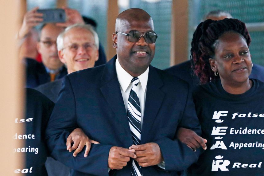 Curtis Flowers, flanked by sister Priscilla Ward, right, exits the Winston Choctaw Regional Correctional Facility in Louisville, Mississippi, on December 16, 2019.