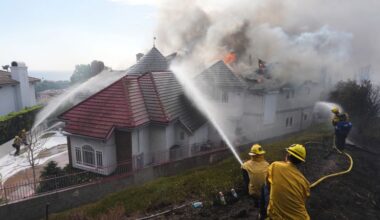 Southern California wildfire in explodes in size, burning multiple homes