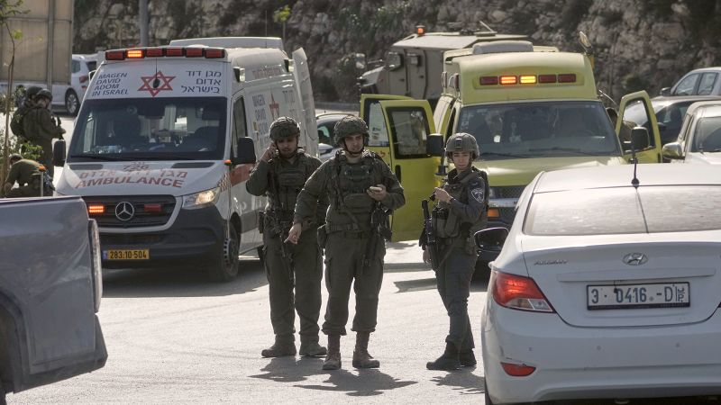 Israel closes West Bank city after at least five Israelis wounded in shooting attack
