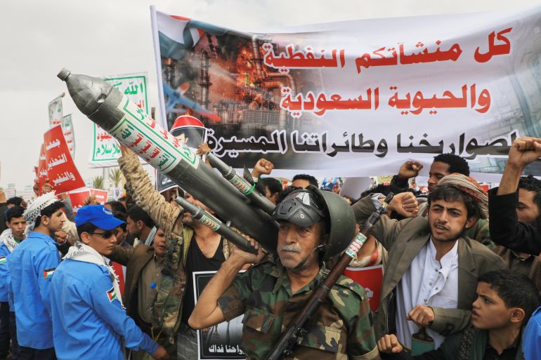 ‘All Saudi oil facilities are targets to our missiles and drones’ reads a banner in Sanaa as Houthi supporters rally against the Saudi-led coalition, July 17, 2026,