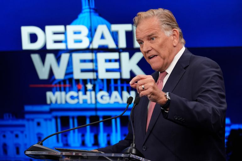 Republican nominee for U.S. Senate Mike Rogers, talks during a televised debate with Democratic nominee for U.S. Senate Abdul El-Sayed, at WOOD-TV, on Thursday, Oct. 8, 2026, in Grand Rapids, Mich. (AP Photo/Paul Sancya, Pool)